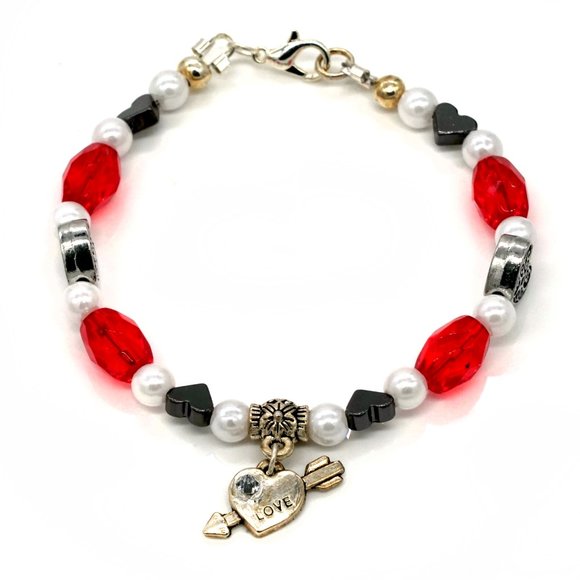Bracelet with red beads and black hearts with charm. - Picture 2 of 2